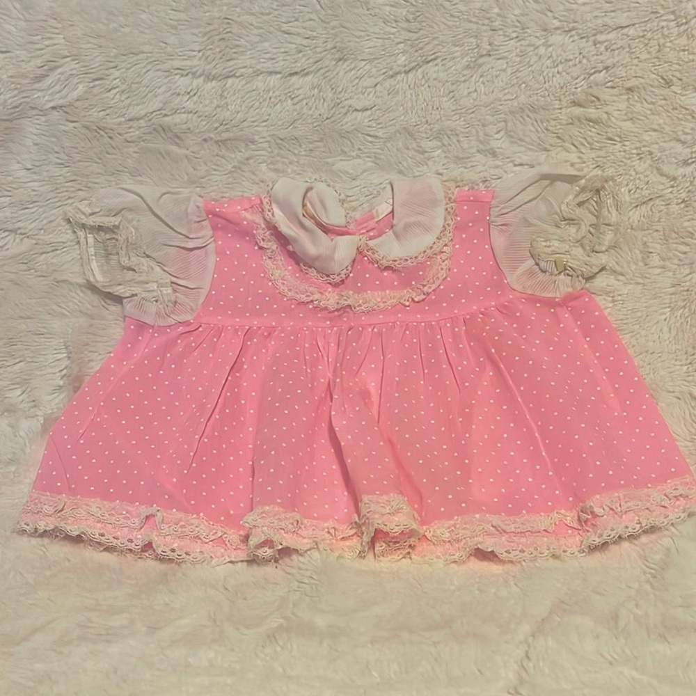 1970’s pink w/ white polka dot dress lines with lace.